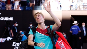 Denis Shapovalov of Canada waves to the crowd following his defeat to Rafael Nadal of Spain during their quarterfinal match at the Australian Open in Melbourne, Australia, on Jan. 25, 2022. (AP Photo/Hamish Blair)