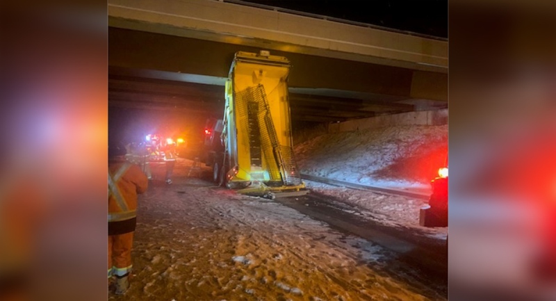 A snow-clearing vehicle struck an overpass on Highway 402 in Plympton-Wyoming, Ont. on Sunday, Jan. 23, 2022. (Source: Lambton County OPP)