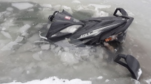 Snowmobile through ice - FILE IMAGE.