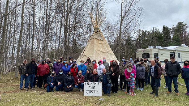 Some members of the 67 families who continue the fight with Parks Canada over expropriation are shown in Kouchibouguac National Park in New Brunswick on Wednesday, May 19, 2021. (THE CANADIAN PRESS/Kevin Bissett)