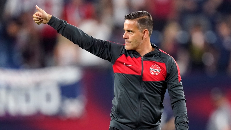 Canada head soccer coach John Herdman salutes the crowd as he leaves the pitch following a 1-1 draw against the United States in a World Cup soccer qualifier on Sept. 5, 2021, in Nashville, Tenn. (AP Photo/Mark Humphrey) 