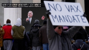 Robert F. Kennedy Jr., is broadcast on a large screen as he speaks during an anti-vaccine rally in front of the Lincoln Memorial in Washington, on Jan. 23, 2022. (Patrick Semansky / AP) 