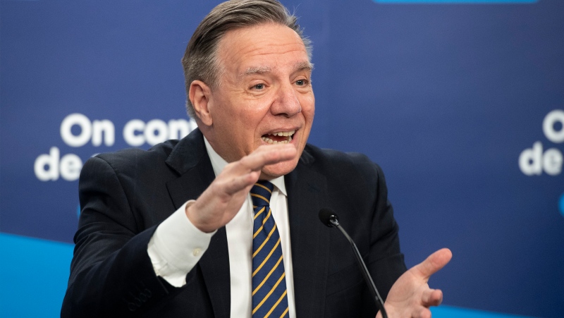 Quebec Premier Francois Legault speaks to the media at a COVID-19 press briefing in Montreal, Tuesday, January 25, 2022. THE CANADIAN PRESS/Graham Hughes