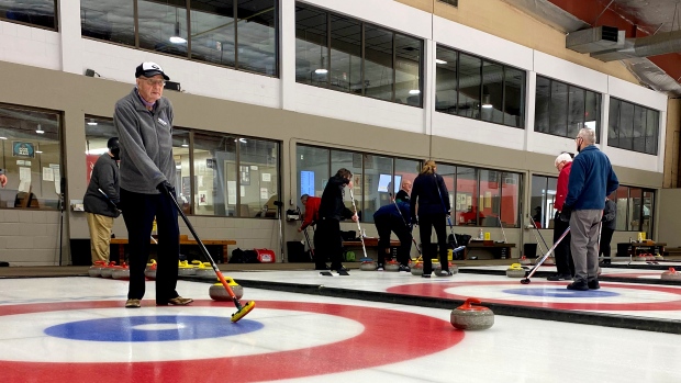 Osborne "Ossie" Lakness curls twice a week at the Callie Curling Club in Regina. (Gareth Dillistone/CTV News) 