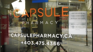 Numerous Calgary pharmacies have signs posted near entrances indicating they are out of the kits provided by the province at no charge.