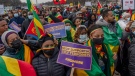 People from Ethiopian and Eritrea, supporters of Ethiopian Prime Minister Abiy Ahmed, participate in a protest against the U.S. and other western countries' intervention in their country and calling for an end to Ethiopia's ongoing internal conflict while in Washington on Dec. 10, 2021. (AP Photo/Gemunu Amarasinghe)