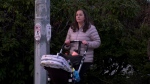 A Surrey mother and her baby daughter were assaulted near a bus loop last month and police are urging any witnesses to come forward.