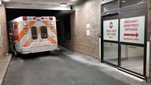 Ambulance is parked at the emergency department at the Lakeridge Health hospital in Bowmanville, Ontario on Wednesday January 12, 2022. THE CANADIAN PRESS/Doug Ives 