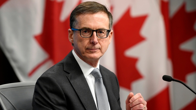 Governor of the Bank of Canada Tiff Macklem prepares for the start of a media availability at the Bank of Canada in Ottawa, on Wednesday, Dec. 15, 2021. THE CANADIAN PRESS/Justin Tang 
