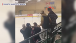 Stony Plain Flyers player Nichlas Johnson fighting a fan in the stands on Jan. 21, 2022. (Source: Barstool 'Berta)