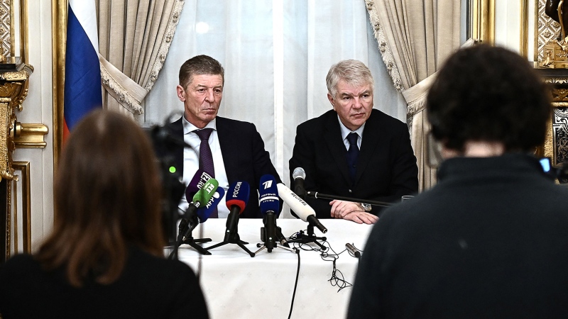 The Kremlin's deputy chief of staff Dmitry Kozak and Russian Ambassador to France Alexey Meshkov hold a news conference at the Russian Ambassador's residence in Paris on Jan. 26, 2022. (LEO PIERRARD/AFP/Getty Images)