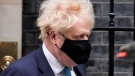 U.K. Prime Minister Boris Johnson leaves 10 Downing Street headed toward parliament in London on Jan. 26, 2022. (AP Photo/Matt Dunham)