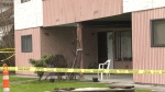 A home behind police tape in Richmond, B.C., after four people were fatally shot. 