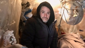 Brian McManus is seen inside his shelter located on an empty lot in west-central London, Ont. on Wednesday, Jan. 27, 2022. (Sean Irvine / CTV News)