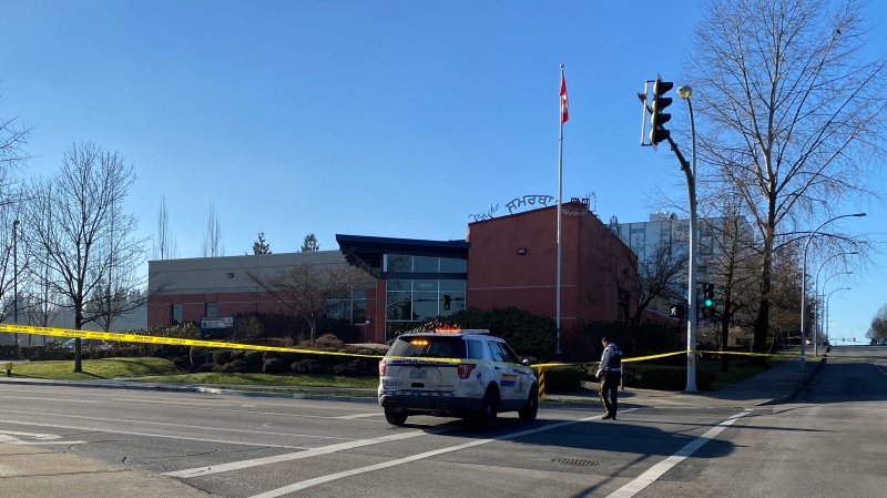 Surrey RCMP's Guildford office is seen cordoned off with caution tape after someone hand-delivered a potentially live grenade on Thursday, Jan. 27, 2022. 
