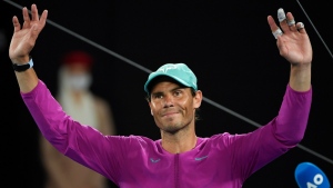 Rafael Nadal celebrates after defeating Matteo Berrettini of Italy in their semifinal match at the Australian Open tennis championships, on Jan. 28, 2022. (Andy Brownbill / AP) 