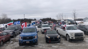 Quebec truckers who disagree with mandatory vaccinations against COVID-19 are gathering at several Canada-U.S. border crossings as they get ready to join the so-called 'Freedom Convoy.' (Ian Wood/CTV News)