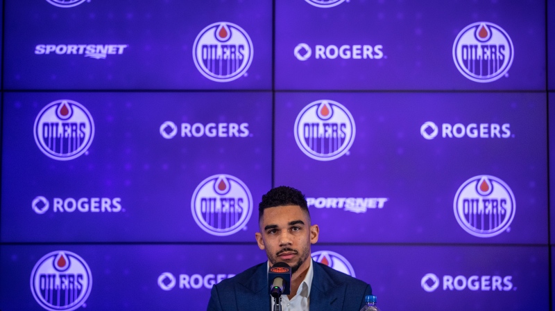 New addition to the Edmonton Oilers Evander Kane, speaks to media in Edmonton, Friday, Jan. 28, 2022. THE CANADIAN PRESS/Jason Franson 