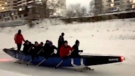 A group of Winnipeg rowers weren't going to let the cold keep them from practising, paddling along on top of a frozen river, on Jan.26