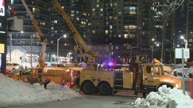 Crews are working to repair fallen hydro wires that prompted the closure of an intersection in Mississauga.