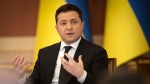 In this handout photo provided by the Ukrainian Presidential Press Office, Ukrainian President Volodymyr Zelensky speaks during a news conference in Kyiv, Ukraine, Friday, Jan. 28, 2022. (Ukrainian Presidential Press Office via AP) 