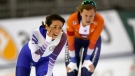 Huang Yu-ting of Taiwan, left, looks on after skating during the women's 1000-metre World Cup speedskating race at the Utah Olympic Oval Saturday, Dec. 4, 2021, in Kearns, Utah. (AP Photo/Rick Bowmer)