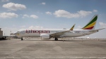 In this March 23, 2019 file photo, an Ethiopian Airlines Boeing 737 Max 8 sits grounded at Bole International Airport in Addis Ababa, Ethiopia. (AP Photo/Mulugeta Ayene, File)