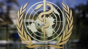 The logo of the World Health Organization is seen at the WHO headquarters in Geneva, Switzerland, June 11, 2009. (AP Photo/Anja Niedringhaus, File)