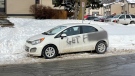 A car parked on an Orléans street was vandalized with crude graffiti. (Peter Szperling/CTV News Ottawa)