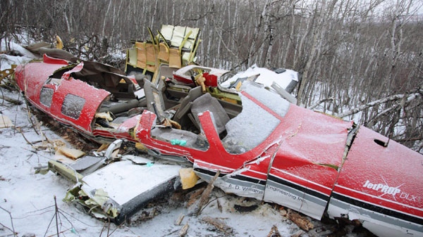 Five people died when an A.D. Williams Engineering Inc. Piper PA-46 Malibu plane wreckage crashed, northeast of Wainwright, Alberta, on Friday, March 28, 2008. The aircraft was en route from Edmonton to Winnipeg. (THE CANADIAN PRESS/John Ulan)