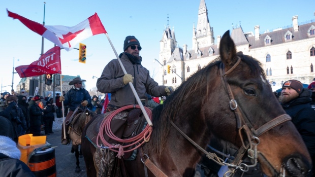 Demonstrators descend on Ottawa as 'freedom convoy' protests spread beyond capital
