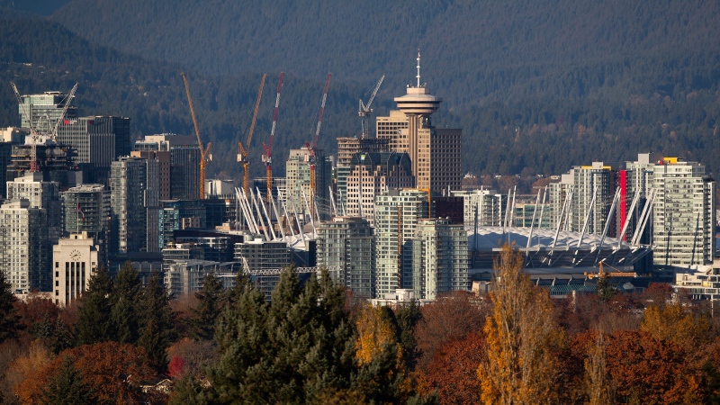 The downtown Vancouver skyline, including BC Place Stadium, condo towers and numerous construction cranes is seen from Queen Elizabeth Park on Nov. 8, 2020. THE CANADIAN PRESS/Darryl Dyck 