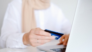 Undated photo of a woman shopping online. (Photo by Anna Shvets from Pexels)