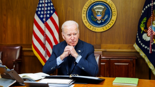 Biden warns Putin of 'severe costs' of Ukraine invasion