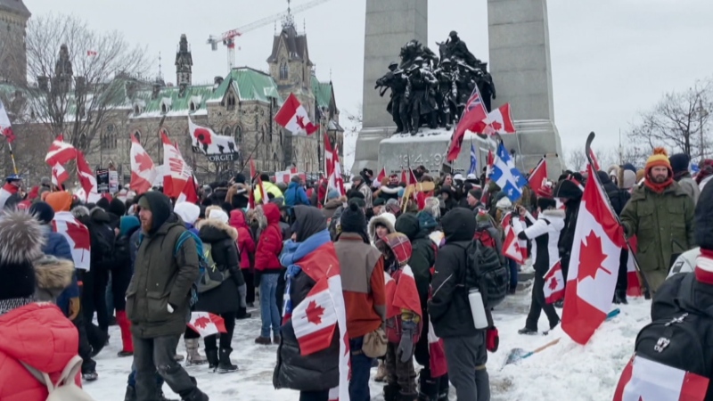 Protesters stand near National War Memorial