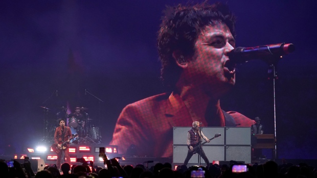 Miley Cyrus, Green Day span decades in pre-Super Bowl show