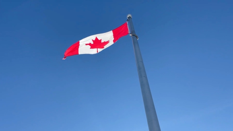 A Canadian flag flies in Ottawa on Feb. 15, 2022. (Peter Szperling/CTV News Ottawa)