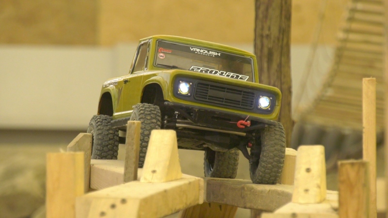 Dakota Drummond drives his rig over an obstacle at Electrosport RC in Ottawa. (Peter Szperling/CTV News Ottawa)