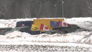 Vehicles parked in a field on White Lake Road, south of Arnprior, Ont. Feb. 22, 2022. (Dylan Dyson/CTV News Ottawa)
