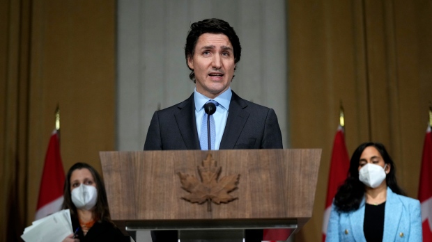 PM announces 'first round' of sanctions against Russia, troop deployment to Latvia