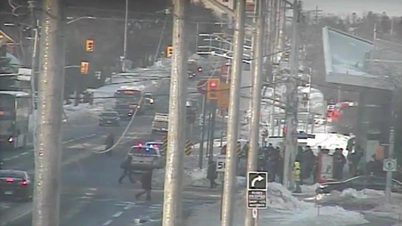 Police at Tunney's Pasture station on Thursday morning. (City of Ottawa traffic camera)