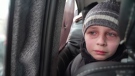 Ukrainian boy in tears after leaving dad behind