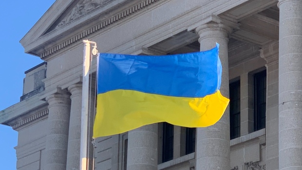 The Ukrainian flag is flown in solidarity in front of the Saskatchewan Legislative Building. (Wayne Mantyka/CTV News) 