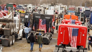 Trucks are parked at Hagerstown Speedway as the People's Convoy of Truckers stages Saturday, March 5, 2022, in Hagerstown, Md. (AP Photo/Jon Elswick) 