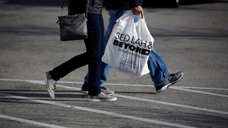A customer carries a Bed Bath & Beyond Inc. shopping bag outside a store in Clarksville, Indiana, U.S., on Sunday, Jan. 5, 2020. (Luke Sharrett/Bloomberg/Getty Images via CNN)