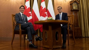 Canadian Prime Minister Justin Trudeau and Polish Prime Minister Mateusz Morawiecki are seen at the start of a meeting at the Chancellery in Warsaw, Poland, Thursday, March 10, 2022. THE CANADIAN PRESS/Adrian Wyld