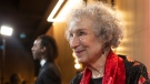 FILE - Margaret Atwood talks to journalists as she arrives on the red carpet for the 2021 Scotiabank Giller Prize, in Toronto, Monday, Nov. 8, 2021. THE CANADIAN PRESS/Chris Young