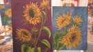 Two of Jill Alexander's sunflower paintings. Proceeds from the sale of these paintings will be donated to the Red Cross in support of Ukraine. (Dylan Dyson/CTV News Ottawa)