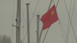 Boat owner refusing to remove Soviet flag
