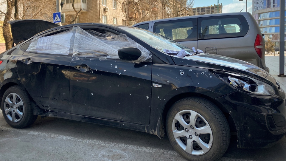 A car damaged by shelling